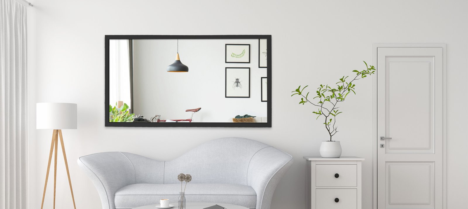 Living room wall mirror installed in a modern Malaysian home interior